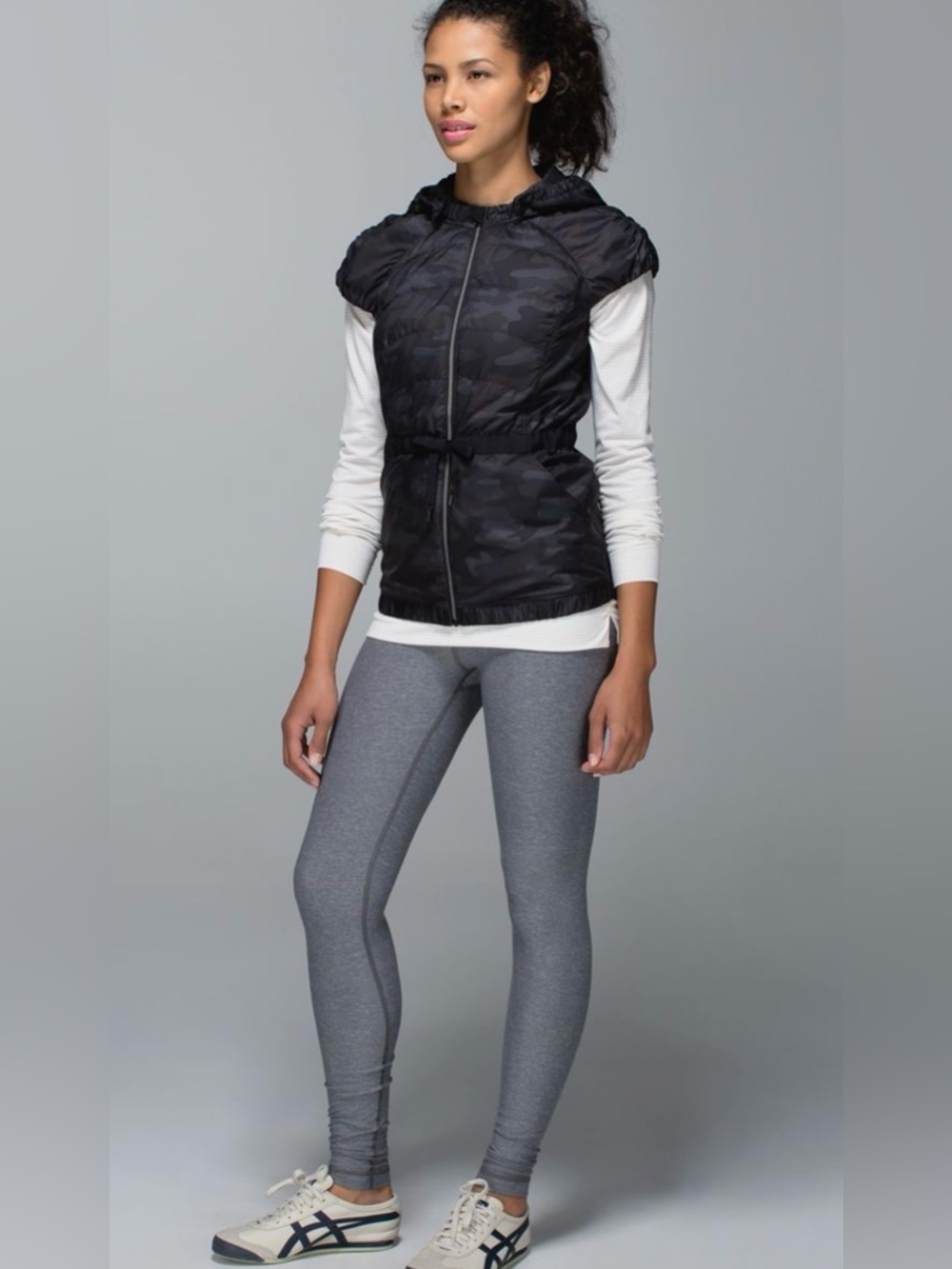 Lululemon Spring Fling Puffy Vest in Lotus Camo Black, size 4.